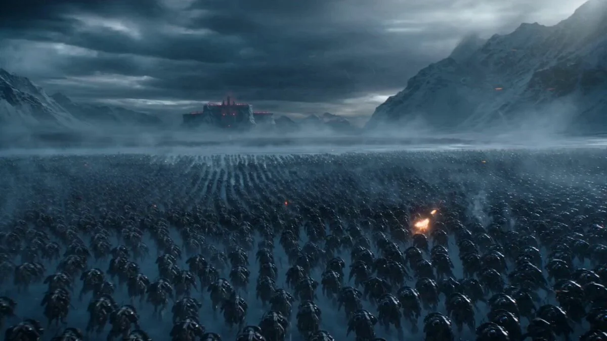 A cinematic wide shot of a fortress built into frozen cliffs.